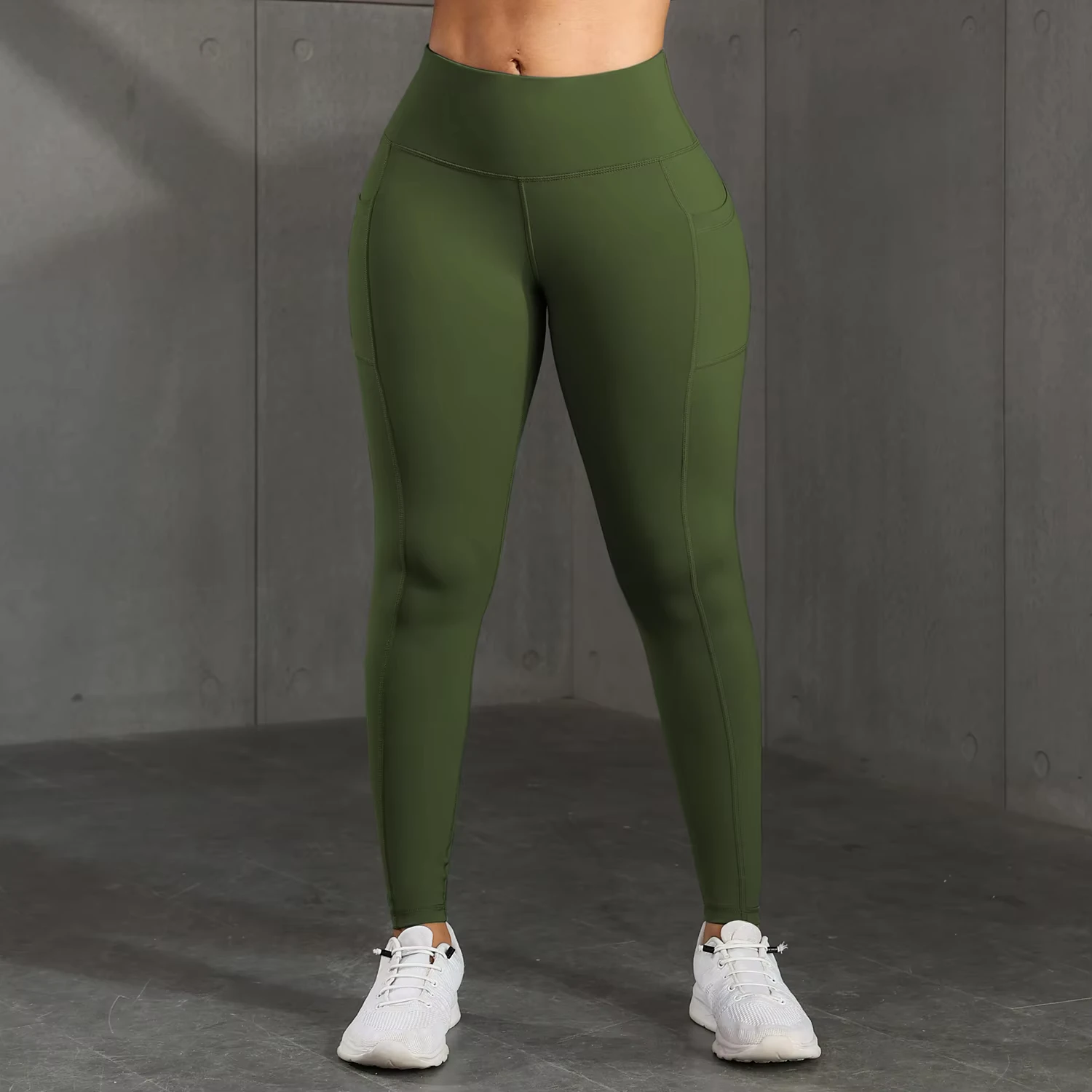 Legging fitness vert avec poche téléphone